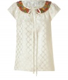 Channel easy boho elegance with Millys cream silk top - Sumptuously soft, lightweight material features a decorative geometric print - Gold sequin and multicolor decorative trim at collar - Cap sleeves and round neckline with key hole detail and long ribbon tie - Slim yet relaxed silhouette hits just below hips - Pair with wide leg trousers, skinny denim or maxi skirts