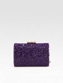 This boxy style sparkles with textured glitter fabric; perfect for a night out.Hinged top clasp closureSatin lining5½W X 3½H X 2½DMade in Italy This boxy style sparkles with textured glitter fabric; perfect for a night out.Hinged top clasp closureSatin lining5½W X 3½H X 2½DMade in Italy