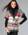 Tommy Hilfiger offers a must-have sweater in lush Fair Isle knit! Toggle closures and a shawl collar lend ski-inspired style to this versatile piece.