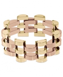 Fashion as an art form. This art deco-inspired bracelet from Michael Kors mesmerizes with an open-link design in golden and rosy hues. Crafted in gold tone and rose-gold tone brass. Approximate length: 7 inches.