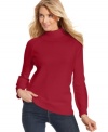 Karen Scott's soft turtleneck sweater features a chic ribbed collar and easy fit. Pair it with jeans for essential weekend style!