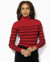 Rendered in luxuriously soft combed cotton, the essential petite Lauren by Ralph Lauren sweater features a chic turtleneck collar with an embroidered LRL motif for a signature look. (Clearance)