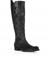 Luxurious boot in black, washed suede - Stylish mix of equestrian and biker boots - Decorative studs on the upper shaft, comfortable zip close - Extremely modern, but not trendy, you can wear this boot forever - Easy to clean and absolutely suitable for winter with that sole - Genius style: with tucked in jeans, a romantic floral dress, a sharp mini