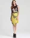 ABS by Allen Schwartz does garden-party chic with this bustier-style dress. With a sheer mesh yoke, a romantic print and a bow-detailed belt, this floral frock is impossible to pass up.