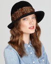 Fabulous pheasant feathers create a colorful, textured band around Eric Javits' hand-blocked velour hat.
