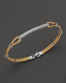 From the Classique Collection, a stackable bangle with diamonds in 18K white gold on stainless steel cable with yellow PVD. Designed by Charriol. From the Classique Collection, a stackable bangle with diamonds in 18K white gold on stainless steel cable with yellow PVD. Designed by Charriol.
