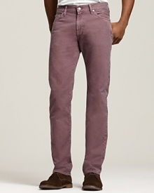These straight leg 7 for All Mankind jeans in a faded purple wash sit low on the waist with a slim fit through hip and thigh and slight tapering at the ankle. Back pocket signature squiggle detail.