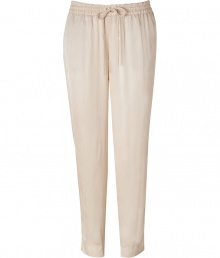 Stylish pants in fine, pure viscose - Sumptuously soft, lightweight material in classic nude - Slim yet relaxed, low rise cut - Gathered drawstring waist - Slash pockets at sides, welt pockets at rear - Fashionable 7/8 length crops at ankles - Casually elegant, easily dressed up or down - Pair with a fitted t-shirt and leather sandals, or try a silk tank, blazer and wedges