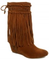 FALCHI by Falchi's Avaa western boots feature stitched detailing on the heel and dramatic fringe detailing that cascades from the top of the shaft.