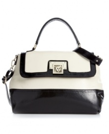 Colorblocking is the craze and this classic design by AK Anne Klein takes the trend to a new level of luxury. Shimmery silver-tone hardware, signature front detailing and posh zebra print lining make this look the silhouette of the season. Colorblocking is the craze and this classic design by AK Anne Klein takes the trend to a new level of luxury. Shimmery silver-tone hardware, signature front detailing and posh zebra print lining make this look the silhouette of the season.