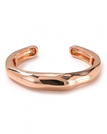 Alexis Bittar's rose gold-plated cuff is a striking example of the label's contemporary edge. With modernism a key trend, this bracelet lends every look a sculptural air.