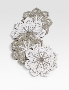 This handcrafted beaded set is perfect for any winter occasion, from renowned designer Sudha Pennathur. Set of 4: 2 silver, 2 whiteEach, 5 diam.Hand-beadedImported This handcrafted beaded set is perfect for any winter occasion, from renowned designer Sudha Pennathur. Set of 4: 2 silver, 2 whiteEach, 5 diam.Hand-beadedImported