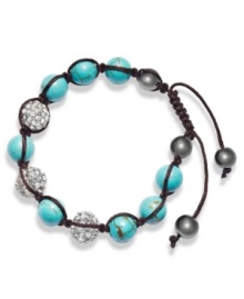 Spiritual-inspired bracelets are all the rage this season! Snap up this hot style from Ali Khan featuring semi-precious turquoise beads and pave glass fireballs on a trendy black cord. Bracelet adjusts to fit the wrist. Approximate diameter: 2 inches. Approximate length: 12-1/4 inches.