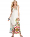 A burst of bold florals make a bright statement on this Desigual maxi dress, perfect for summer style!