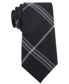 Plaid and simple. This Calvin Klein tie brings a whole new pattern to your tie collection. Plaid and simple. This Calvin Klein tie brings a whole new pattern to your tie collection.