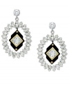 Add a little drama to your day. Juicy Couture's rhinestone earrings feature a cubic zirconia hanging at the center, surrounded by gold tones. Crafted in silver tone mixed metal. Approximate drop: 2-1/2 inches.