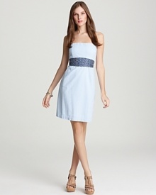 Sharp seersucker stripes pattern the fitted silhouette of this Vineyard Vines strapless dress. Tie the whale-print sash at the waist for a whimsical touch. Sharp seersucker stripes pattern the fitted silhouette of this Vineyard Vines strapless dress. Tie the whale-print sash at the waist for a whimsical touch.