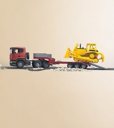 The low loader truck features a forward-tilting driver's cab, doors that open and close, a detachable trailer and soft rubber sculptured tires. The flat bed ramps lift up and are held by bars or can tilt down when the bars are unhooked, allowing the bulldozer to roll on and off. The CAT Bulldozer's blade and rake moves up and down.Plastic7.3 X 10.2 X 30Recommended for ages 3 and upMade in Germany