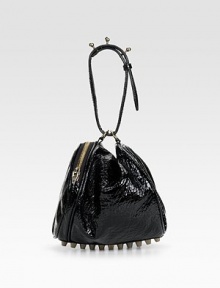 High shine patent leather with a pebbled finish, in a slouchy pouchette shape, adorned with stand-out studs on the circular handle and at the base.Circular handle, about 7 drop Side zip closure Rows of metal feet Fully lined 10W X 7H X 7½D Imported High shine patent leather with a pebbled finish, in a slouchy pouchette shape, adorned with stand-out studs on the circular handle and at the base.Circular handle, about 7 drop Side zip closure Rows of metal feet Fully lined 10W X 7H X 7½D Imported
