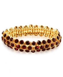 An elegant finishing touch from Anne Klein. Glass and plastic stones in red hues lend a look of romance to this bracelet. Crafted in gold tone mixed metal. Approximate diameter: 3 inches. Stretches to fit wrist. An elegant finishing touch from Anne Klein. Glass and plastic stones in red hues lend a look of romance to this bracelet. Crafted in gold tone mixed metal. Approximate diameter: 3 inches. Stretches to fit wrist.