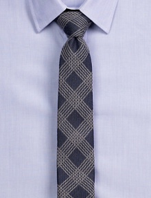 A sartorial finish to your office attire, finely crafted in luxurious patterned silk.About 2½ wideSilkDry cleanImported