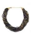 An intricate array of seed bead strands forms this striking torsade necklace from Kenneth Cole New York. Featuring violet, navy, gold and pewter beaded details, it's set in gold tone mixed metal. Approximate length: 18 inches + 3-inch extender.