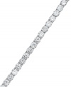 Classically chic. Every girl should have this Eliot Danori bracelet in her collection. A traditional tennis bracelet design is decorated by a seamless row of round-cut cubic zirconias (13-1/3 ct. t.w.). Set in silver tone mixed metal. Approximate length: 7-1/4 inches.