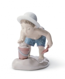 Recall blissful summers spent building sandcastles and catching crabs with this glazed Lladro figurine capturing all the joy of kids at the beach. Recall blissful summers spent building sandcastles and catching crabs with this glazed Lladro figurine capturing all the joy of kids at the beach.