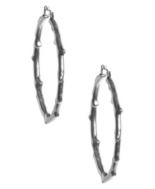 Branch out...literally! Lucky Brand's trendy twig-shaped earrings form a traditional hoop design that blends effortlessly with any look. Set in silver tone mixed metal. Approximate diameter: 2-1/4 inches. Branch out...literally! Lucky Brand's trendy twig-shaped earrings form a traditional hoop design that blends effortlessly with any look. Set in silver tone mixed metal. Approximate diameter: 2-1/4 inches.