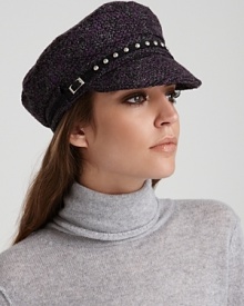 A studded trim lends edge to this classic tweed boucle cap from August Accessories. A studded trim lends edge to this classic tweed boucle cap from August Accessories.