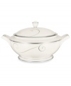 Fluid platinum scrolls glide freely throughout this beautiful fine china covered vegetable bowl from Noritake. Easy to match with any decor, the fresh and elegant Platinum Wave collection of dinnerware and dishes is a timeless look for fine dining or luxurious everyday meals. Holds 67 oz.