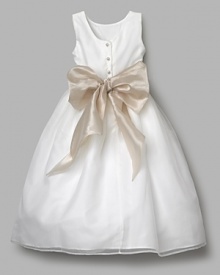 Charming party dress in sleek organza. Drop waist with coordinating sash and full, pleated skirt. Crew neckline, wide shoulder straps and four pearl button closures at the back. Charming party dress in sleek organza. Drop waist with coordinating sash and full, pleated skirt. Crew neckline, wide shoulder straps and four pearl button closures at the back.