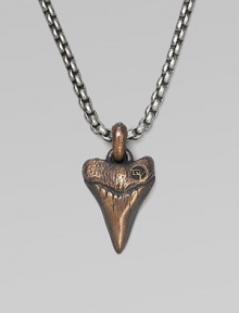 A shark's tooth pendant is handsomely craft, lending to lend a new look to any man's collection. From the Small Amulet Collection Titanium Bronze 2.7mm box chain length, 22 Lobster clasp Imported A shark's tooth pendant is handsomely craft, lending to lend a new look to any man's collection. From the Small Amulet Collection Titanium Bronze 2.7mm box chain length, 22 Lobster clasp Imported