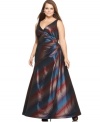 Gorgeous multicolored stripes adorn this plus size dress by Alex Evenings. Seamed details and a surplice neckline lend a crisp, tailored look to the A-line silhouette.