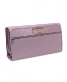 An understated design packs in true polish and sophistication for an always-smooth landing. The coordinating amethyst lining adds a lively contrast that guarantees style is always in the bag. An understated design packs in true polish and sophistication for an always-smooth landing. The coordinating amethyst lining adds a lively contrast that guarantees style is always in the bag.