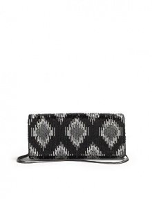 THE LOOKRemovable chainIntricate beadwork creates an ikat-inspired diamond patternMagnetic flap closureOne inside open pocketInside logo detailTHE MEASUREMENTChain, 8 drop8W X 4H X 1½DTHE MATERIALBeaded fabricSatin liningORIGINImported