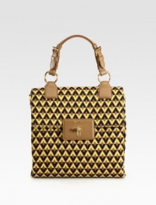 Nylon jacquard flap bag with gusset.Saffiano leather top handle, 5½ dropClock lock closureThree inner compartmentsOne inside zip pocketThree inside open pocketsSignature jacquard lining10¼W X 9½H X 4DMade in Italy Nylon jacquard flap bag with gusset.Saffiano leather top handle, 5½ dropClock lock closureThree inner compartmentsOne inside zip pocketThree inside open pocketsSignature jacquard lining10¼W X 9½H X 4DMade in Italy