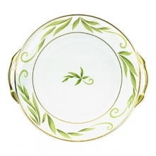 Frivole combines daring originality with soft feminity to create a sophisticated design for the table. Sprawling leaf-work designs add exuberant elegance to this whimsical pattern. Coordinating colors of amethyst and sage with gold trim allow versatility when entertaining formally or casually. Frivole combines daring originality with soft feminity to create a sophisticated design for the table. Sprawling leaf-work designs add exuberant elegance to this whimsical pattern. Coordinating colors of amethyst and sage with gold trim allow versatility when entertaining formally or casually.