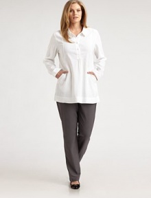 The perfect wear-everywhere piece, finished with side slash pockets and delicate gathered details.Shirt collarButton placket with gathered detailSide slash pocketsLong sleeves with button cuffsGathers at back yokeAbout 32 from shoulder to hem62% linen/36% viscose/2% spandexDry cleanImported of Italian fabric