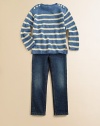 A preppy striped pattern accents an airy, open-weave sweater with precious anchor-embossed buttons for nautical-inspired charm.BoatneckLong sleevesShoulder buttonsEven vented hemLinenDry cleanImported