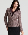 A clean, collarless neckline creates a minimalist silhouette on this Tahari ASL tweed jacket--the perfect contrast to smart, all-over tweed.