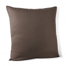 A delicate woven pattern of oval bands adorns this Calvin Klein coverlet, creating a gorgeously rich addition to your boudoir. A delicate woven pattern of oval bands adorns this Calvin Klein coverlet, creating a gorgeously rich addition to your boudoir.