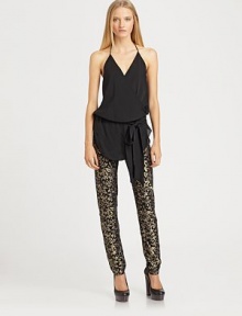 Crossover v-neck and waist self-tie add a wrap-like effect to this whisper-light silk tank. HalterCrossover v-neckWaist self-tieContour hem hits below the hipsSilkDry cleanImportedModel shown is 5'10 (177cm) wearing US size Small. Crossover v-neck and waist self-tie add a wrap-like effect to this whisper-light silk tank. HalterCrossover v-neckWaist self-tieContour hem hits below the hipsSilkDry cleanImportedModel shown is 5'10 (177cm) wearing US size Small.