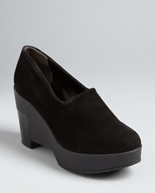 These Robert Clergerie wedges are patently chic, with shining leather heels set against sleek suede.