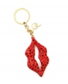 Perfectly pragmatic and pretty. RACHEL Rachel Roy's glitter lips key chain adds fun feminine flair to an everyday item. Set in gold tone mixed metal with sparkling crystal details. Approximate length: 3-3/10 inches.