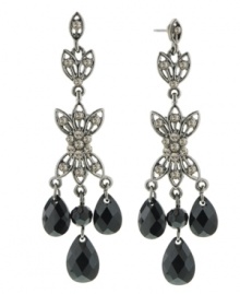 Dramatically decorative. Add an elegant, vintage-style aesthetic to your evening look with these beautifully beaded chandelier earrings from 2028. Crafted in hematite tone mixed metal. Approximate drop: 2-1/2 inches. Dramatically decorative. Add an elegant, vintage-style aesthetic to your evening look with these beautifully beaded chandelier earrings from 2028. Crafted in hematite tone mixed metal. Approximate drop: 2-1/2 inches.