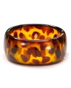 Make a modern meets Mod statement with this tortoise shell cuff from Kenneth Jay Lane, crafted of resin with a hinged closure.