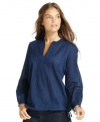 Look casual chic in this sheer petite blouse from Calvin Klein Jeans.