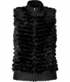 The perfect layering piece, this luxe fur sweater vest from Theory instantly upgrades your casual basics - Ribbed stand collar, sleeveless, front zip closure, ribbed hem - Easy slim fit - Style with a mini-dress, lace up booties, and a sturdy leather satchel