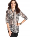 Add a vibrant touch to your look with this animal-print NY Collection blouse.